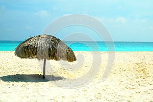 Perfect beach with parasol photo