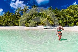 Close up portrait of beautiful young woman enjoying the sun at beach. Summer travel concept design. Summer beach vacation holiday