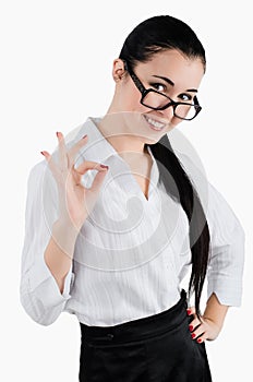 Perfect - business woman showing OK hand sign smiling happy. White background. Studio shot