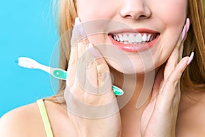 Perfect healthy teeth smile of a woman. Teeth Whitening. Dental health Concept. Promotional picture for a dental clinic.