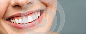 Perfect healthy teeth smile of a young woman. Teeth whitening. Dental clinic patient. Image symbolizes oral care