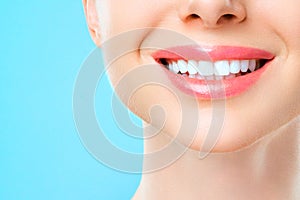 Perfect healthy teeth smile of a young woman. Teeth whitening. Dental clinic patient. Stomatology concept.