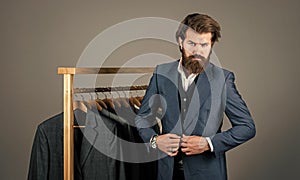 Perfect male. formal and office wardrobe. businessman. confident tailor designing male jacket. handsome sartor with tape