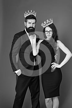 Perfect match. Elite society. Being recognised and proud. Proud couple. Woman and bearded man wear crowns. Selfish photo