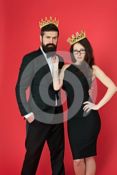 Perfect match. Elite society. Being recognised and proud. Proud couple. Woman and bearded man wear crowns. Selfish photo