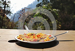 A perfect mountain travel shot with maggi and mountains and perfect weather