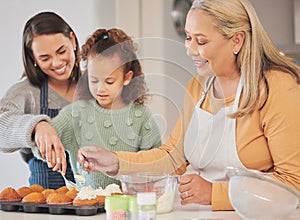 These are perfect for my schools bake sale. Shot of a little girl baking with her mother and grandmother at home.