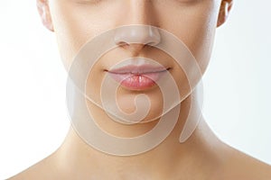 Perfect natural lip makeup.Lip Protection. Close up beautiful female mouth. Plump full lips.Lip Care
