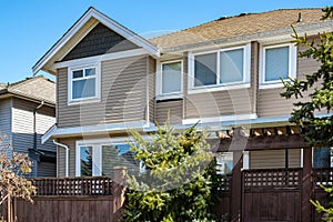 A perfect neighborhood. Houses in suburb in the north America. Real Estate Exterior Front House on a sunny day