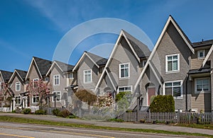 Perfect neighborhood. Houses in suburb at Spring in the north America. Real Estate Exterior Front Houses on a sunny day