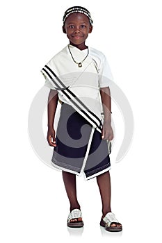 Perfect portrait of young tradtion. Studio shot of a young african girl posing in traditional clothing, isolated on