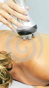 Perfect radio treatment. Woman at spa procedure. Doctor hand and girl body. RF