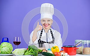 Perfect recipe. Turn ingredients into delicious meal. Culinary skills. Woman chef wear hat apron near table ingredients