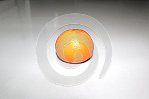A perfect ripen orange fruit isolated on white background
