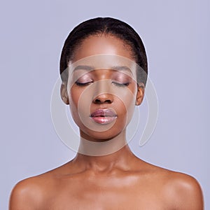 Perfect skin can be yours. Head and shoulders studio shot of a beautiful african american model.