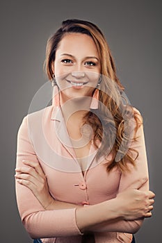 Perfect Smiling Woman Fashion Model wearing Pink Suit