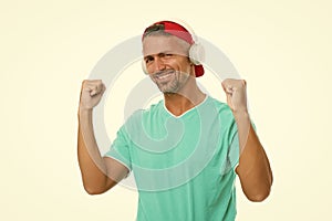 Perfect sound concept. Electronic dance music and house tracks. Guy in cap listen music stereo headphones. Instrumental