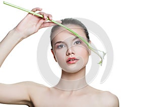 Perfect spa woman with flower isolated on white background. Beautiful female model face. Facial treatment, cosmetology, beauty