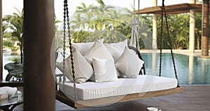 The Perfect Spot for a Porch Swing on a Terrace Corner, Against a Swimming Pool Backdrop, for Peaceful Moments