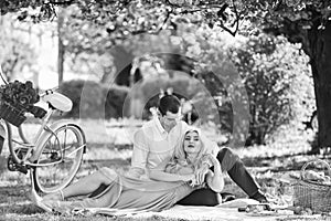 Perfect spring date. Idyllic moment in garden. Man and woman in love. Picnic time. Long lasting relationship. Couple