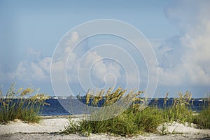 A perfect summer day on the beach with blue skies and white clouds in Ft.Myers Beach, Florida.