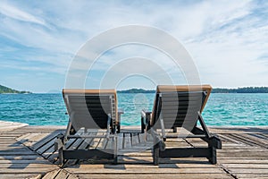 Perfect summer tropical paradise beach with lounge chairs at resort in Phuket, Thailand. Vacation summer holidays and travel