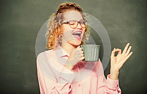 Perfect taste. idea and inspiration. good morning. girl refreshing with tea drink. woman with coffee cup at blackboard