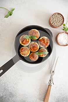 Zucchini stuffed with veggies