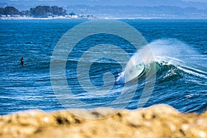 Perfect wave breaking in south Santa Cruz in California.