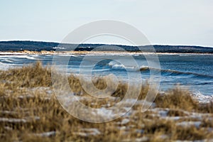 Perfect wave on a sunny day with foreground background bohkeh