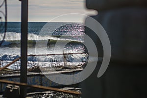 Perfect wave on a sunny day with foreground background bohkeh