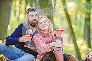 This is perfect wine. Family picnic. Valentines day. couple in love relax in autumn forest. camping and hiking. cheers