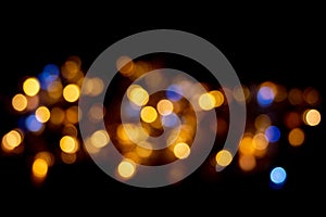 Perfect yellow and blue bokeh for a festive background. De-focused Abstract Light Circles