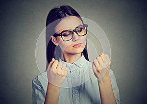 Perfectionist woman looking at nails obsessing about cleanliness photo