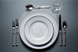 Perfectly arranged, knife, fork, spoon, plate for a memorable dinner
