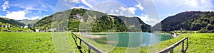 Perfectly clear emerald lake in Valchiavenna, Italy