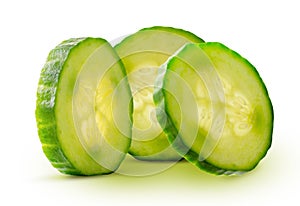 Perfectly retouched cucumber slices glowing from within isolated on white background