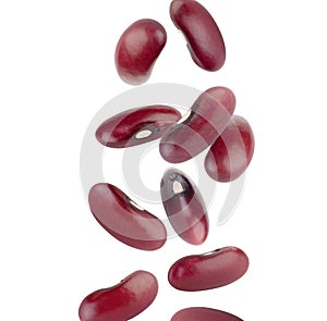 Perfectly retouched dark red beans fly in space. Isolated on white