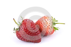 Perfectly retouched fresh strawberry fruit with sliced half isolated on white background.