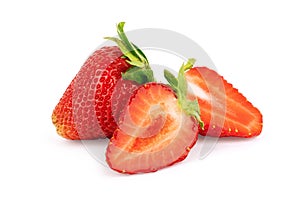 Perfectly retouched strawberry with sliced half and leaves isolated on white background with clipping path