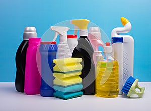 Perfectly retouched various cleaning supplies, detergents and cleaning products on colored background