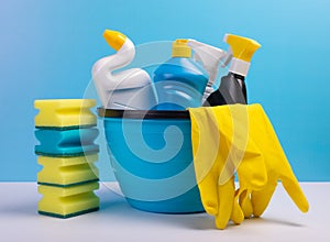 Perfectly retouched various cleaning supplies, detergents and cleaning products on colored background