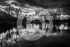 Perfectly symmetric clouds and trees reflections on Colfiorito Umbira swamp