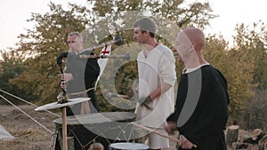 Perfomance medieval ensemble of monks Templars