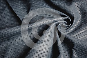 Perforated genuine leather background texture.