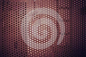 Perforated metal plate, textured background