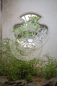 Perforated Window Canglang Pavilion, Suzhou Gardens, China.