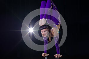 Performance of an air gymnast in a circus