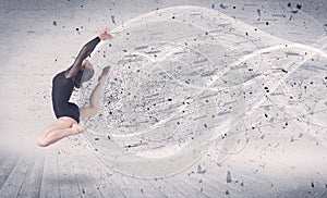 Performance ballet dancer jumping with energy explosion particle