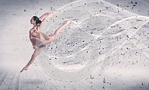 Performance ballet dancer jumping with energy explosion particle